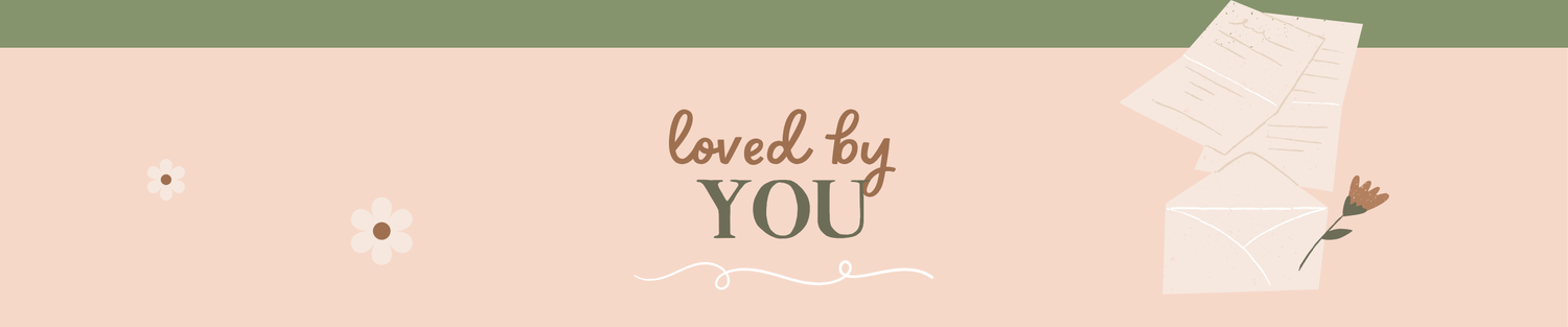 A decorative banner-style graphic with a pale peach background, a dark green horizontal band across the top, the phrase 'loved by YOU' in brown and navy lettering, small flower illustrations, and a stack of papers with a flower on the right side.